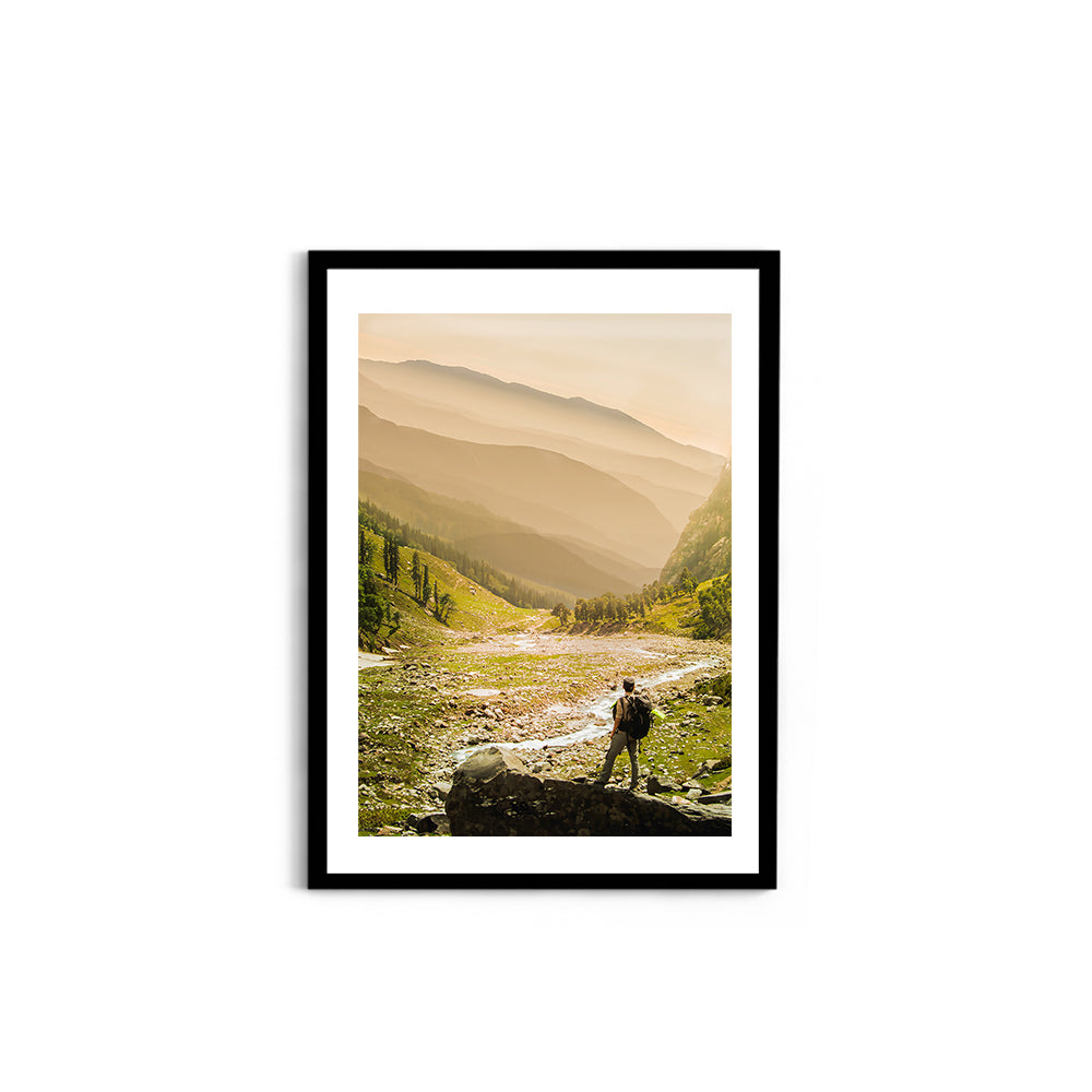 Hiker on rock end above valley - Hampta Pass - Wall Photo Frame by Jeet Khagram