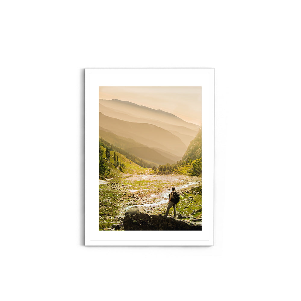 Hiker on rock end above valley - Hampta Pass - Wall Photo Frame by Jeet Khagram
