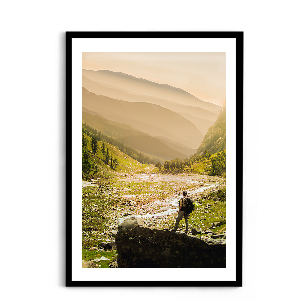Hiker on rock end above valley - Hampta Pass - Wall Photo Frame by Jeet Khagram