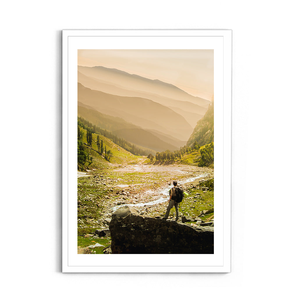 Hiker on rock end above valley - Hampta Pass - Wall Photo Frame by Jeet Khagram