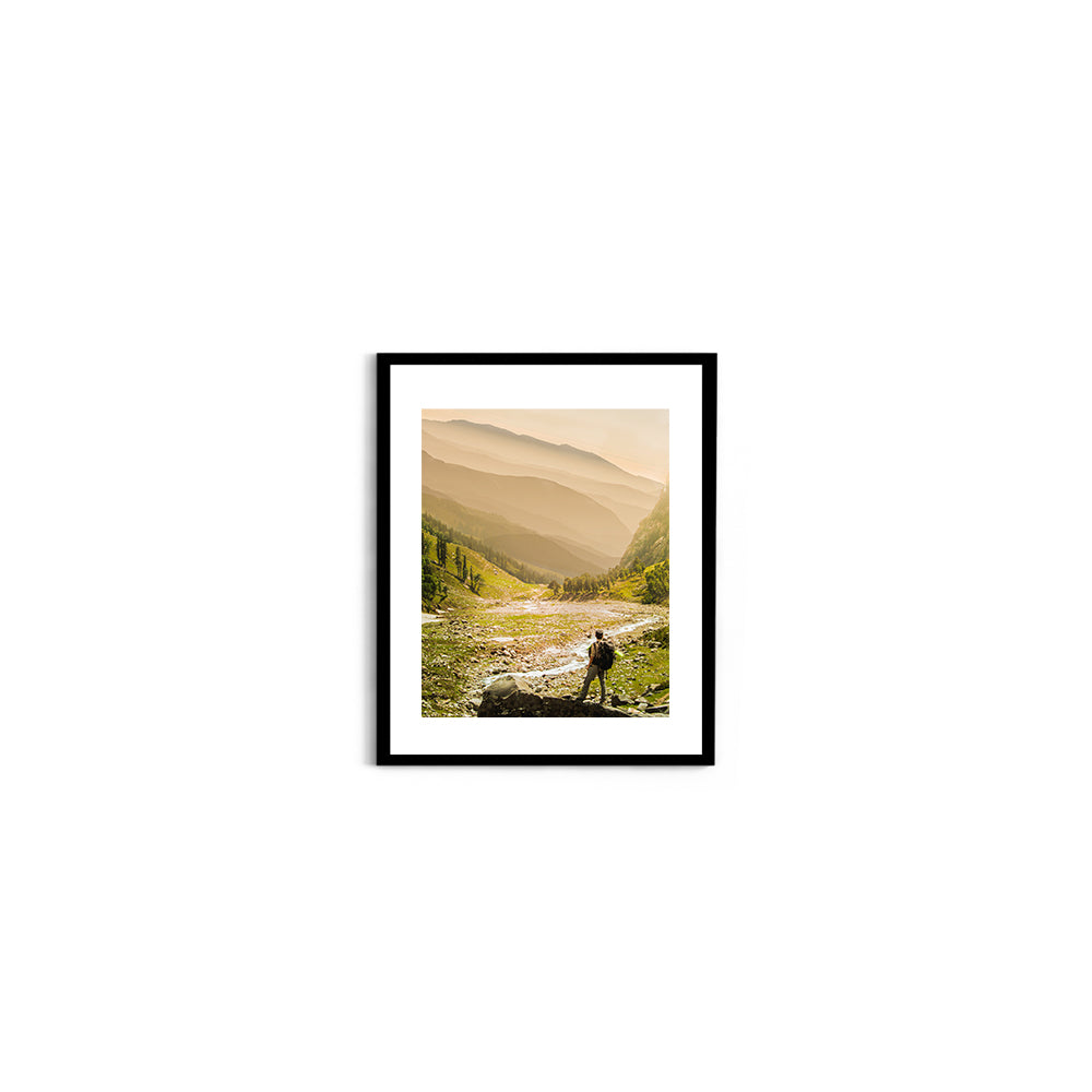 Hiker on rock end above valley - Hampta Pass - Wall Photo Frame by Jeet Khagram
