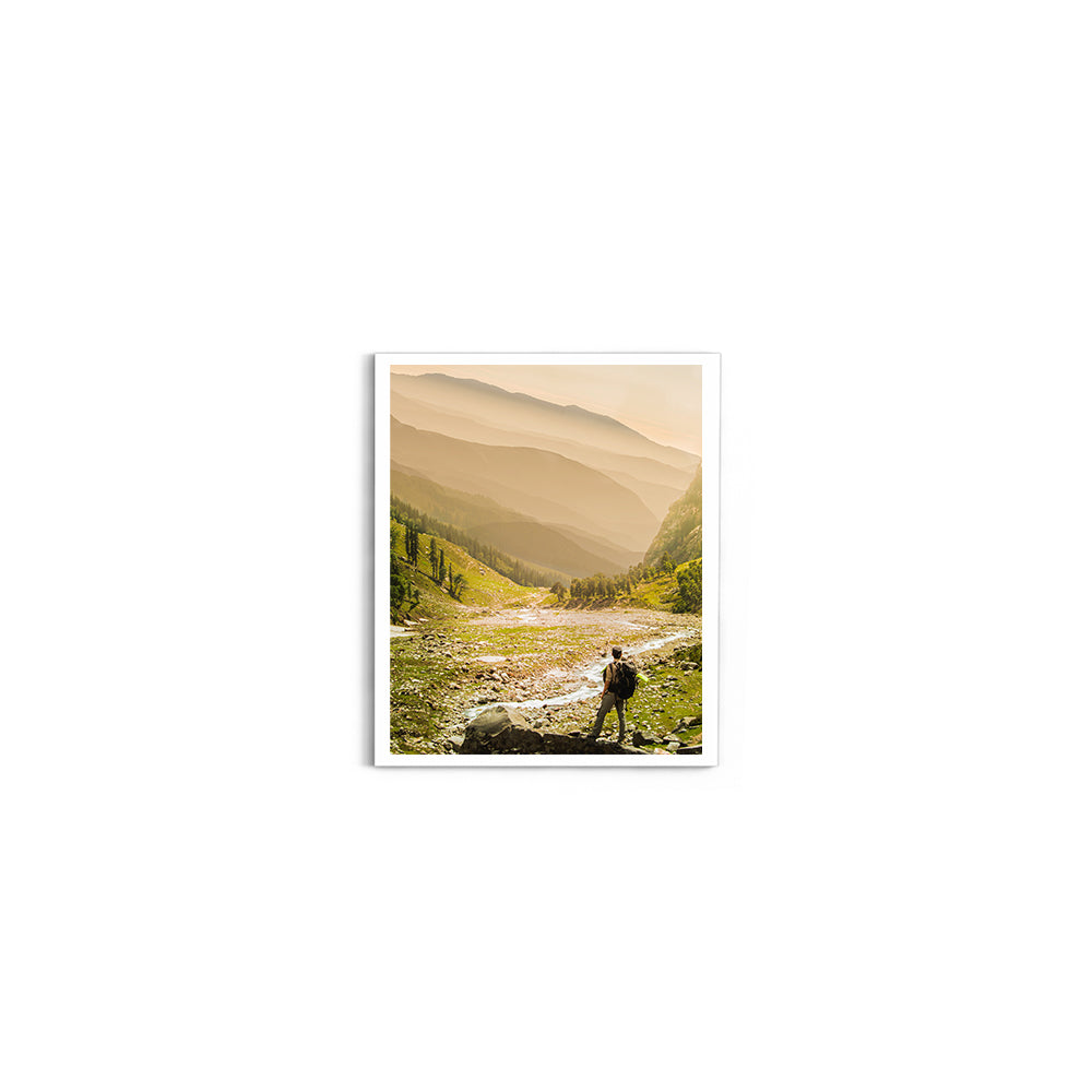 Hiker on rock end above valley - Hampta Pass - Wall Photo Frame by Jeet Khagram