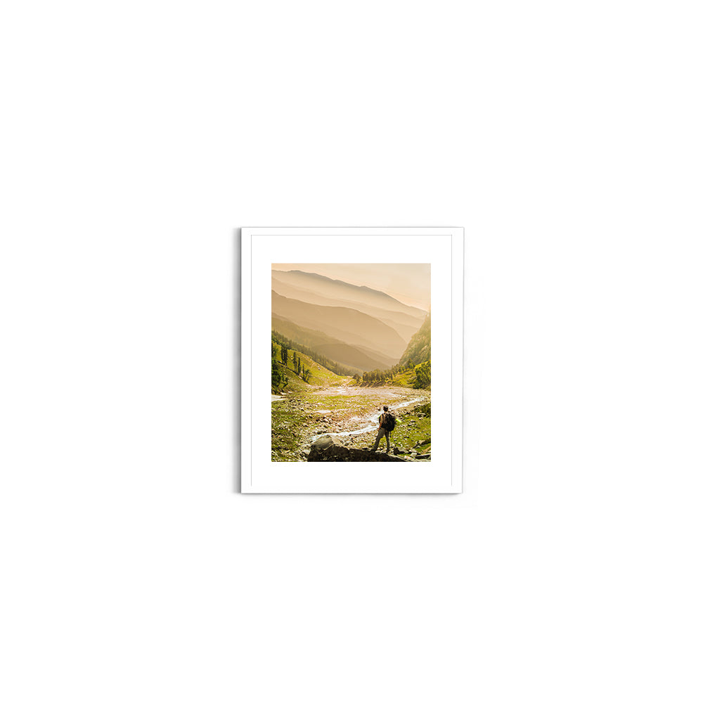 Hiker on rock end above valley - Hampta Pass - Wall Photo Frame by Jeet Khagram
